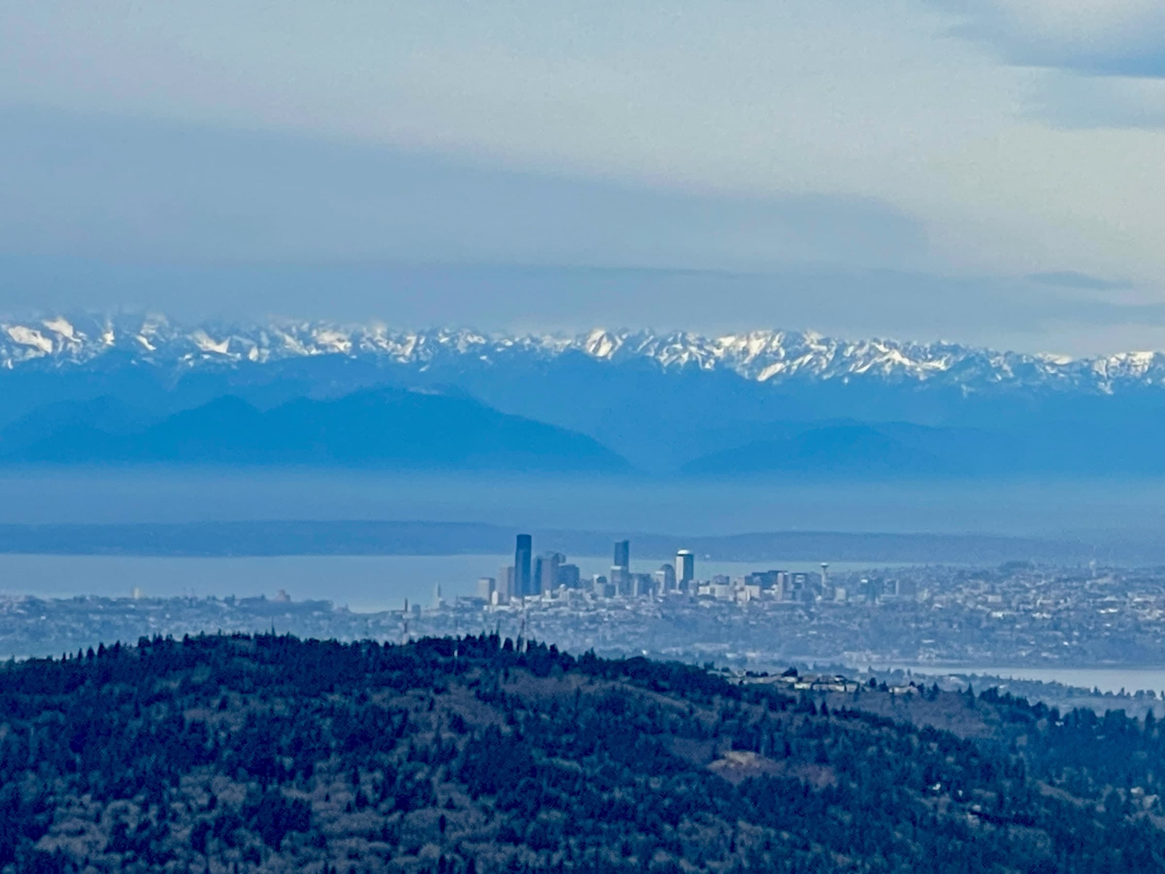 The downtown Seattle skyline on Puget Sound with the Olympic Mountains beyond