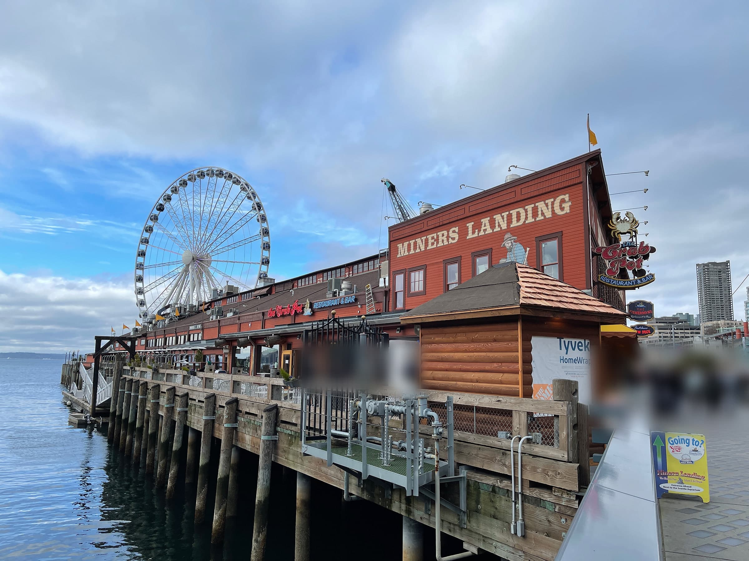 The Seattle waterfront piers and the Great Wheel on Elliott Bay